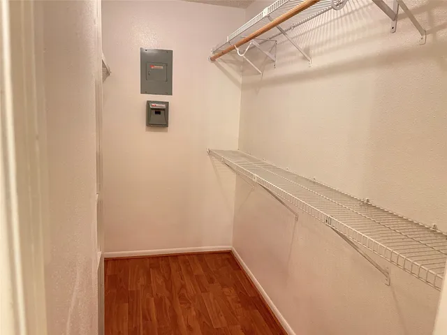 a view of an empty walk in closet
