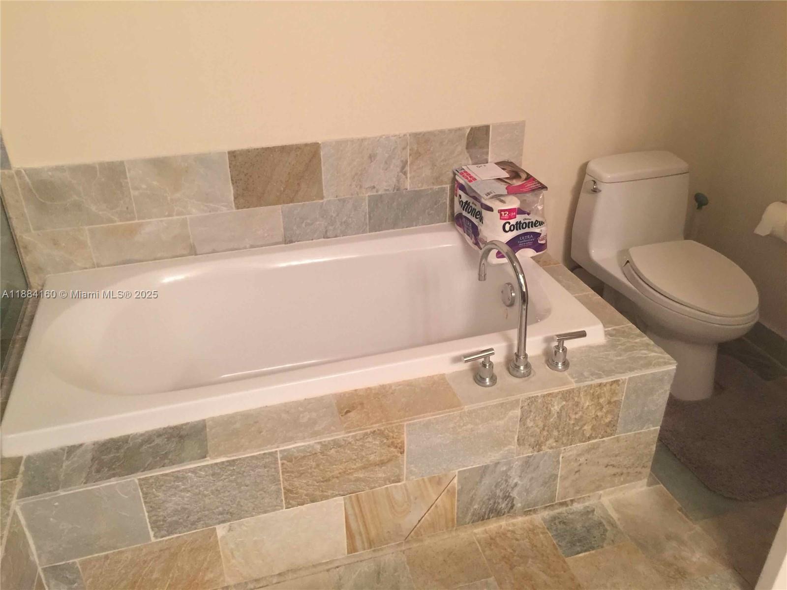 2641 North Flamingo Road, Unit 1705N Sunrise, FL 33323 - Photo 28 of 56 a bathroom with a toilet and a shower