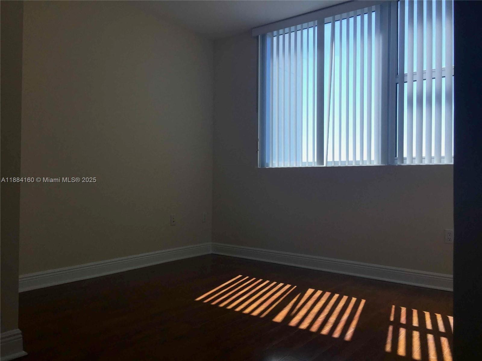 2641 North Flamingo Road, Unit 1705N Sunrise, FL 33323 - Photo 30 of 56 a view of a room with wooden floor