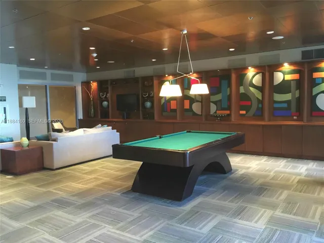 a view of kitchen with granite countertop window and dining table