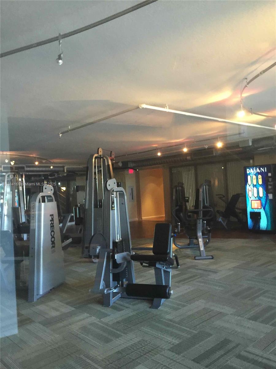 2641 North Flamingo Road, Unit 1705N Sunrise, FL 33323 - Photo 55 of 56 a view of a room with gym equipment