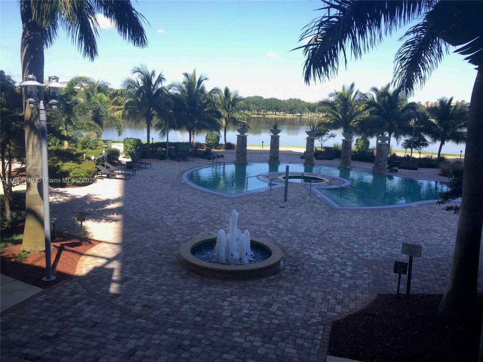 2641 North Flamingo Road, Unit 1705N Sunrise, FL 33323 - Photo 56 of 56 a view of a yard with palm trees