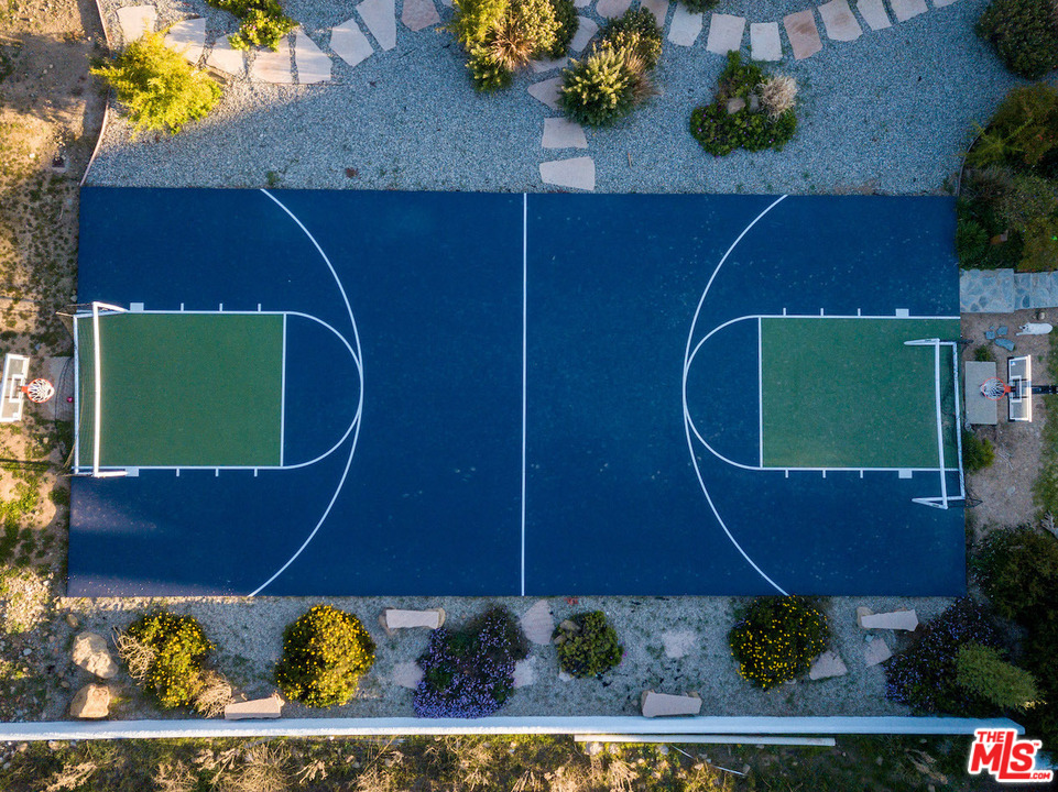 129 Saddlebow Road Bell Canyon, CA 91307 - Photo 1 of 39 an aerial view of a house with a yard