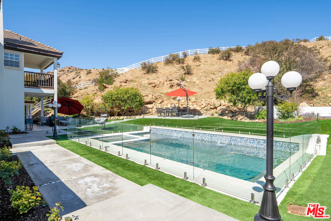 129 Saddlebow Road Bell Canyon, CA 91307 - Photo 16 of 39 a view of a garden with an outdoor space