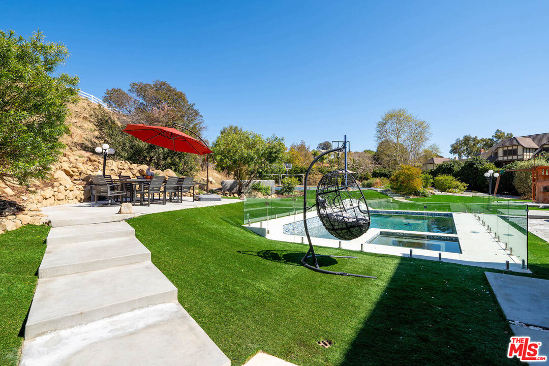 129 Saddlebow Road Bell Canyon, CA 91307 - Photo 24 of 39 a view of a park with large trees