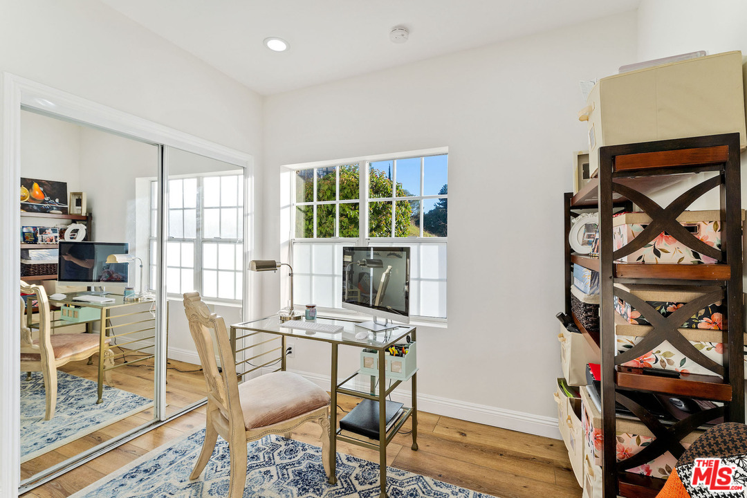 129 Saddlebow Road Bell Canyon, CA 91307 - Photo 31 of 39 a workspace with wooden floor and a window