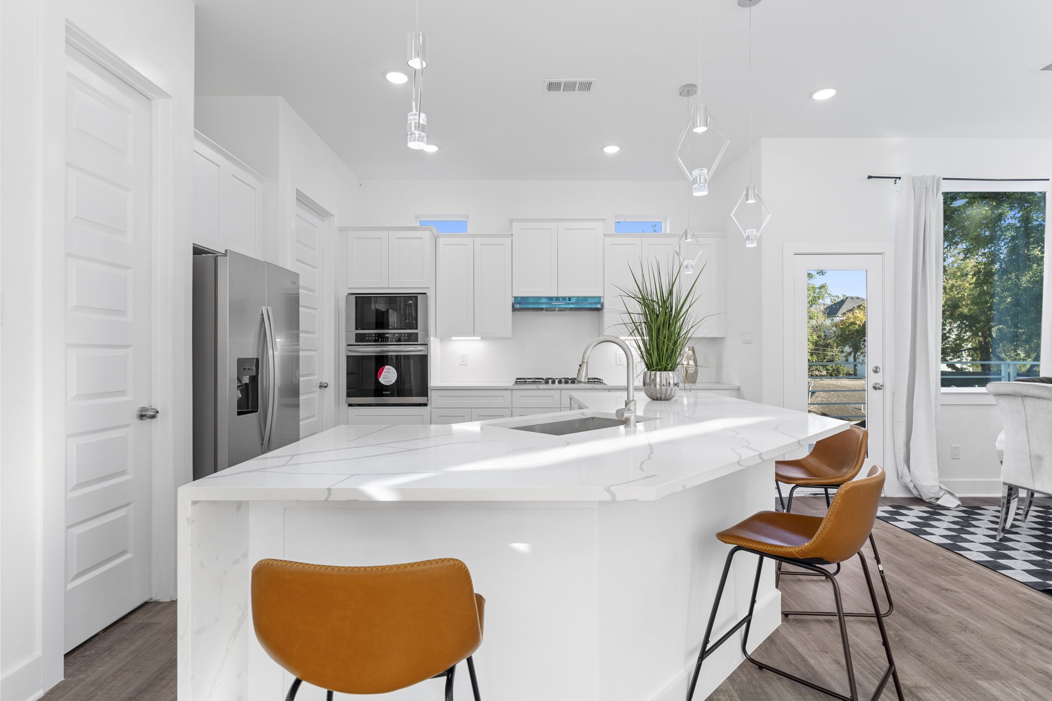4017 Ward Street Houston, TX 77021 - Photo 8 of 45 Bright and modern kitchen showcasing clean lines and designer finishes.