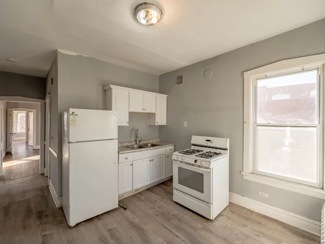 a view of livingroom with furniture wooden floor and window
