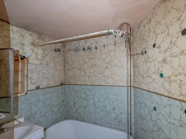 a aerial view of a house with garden