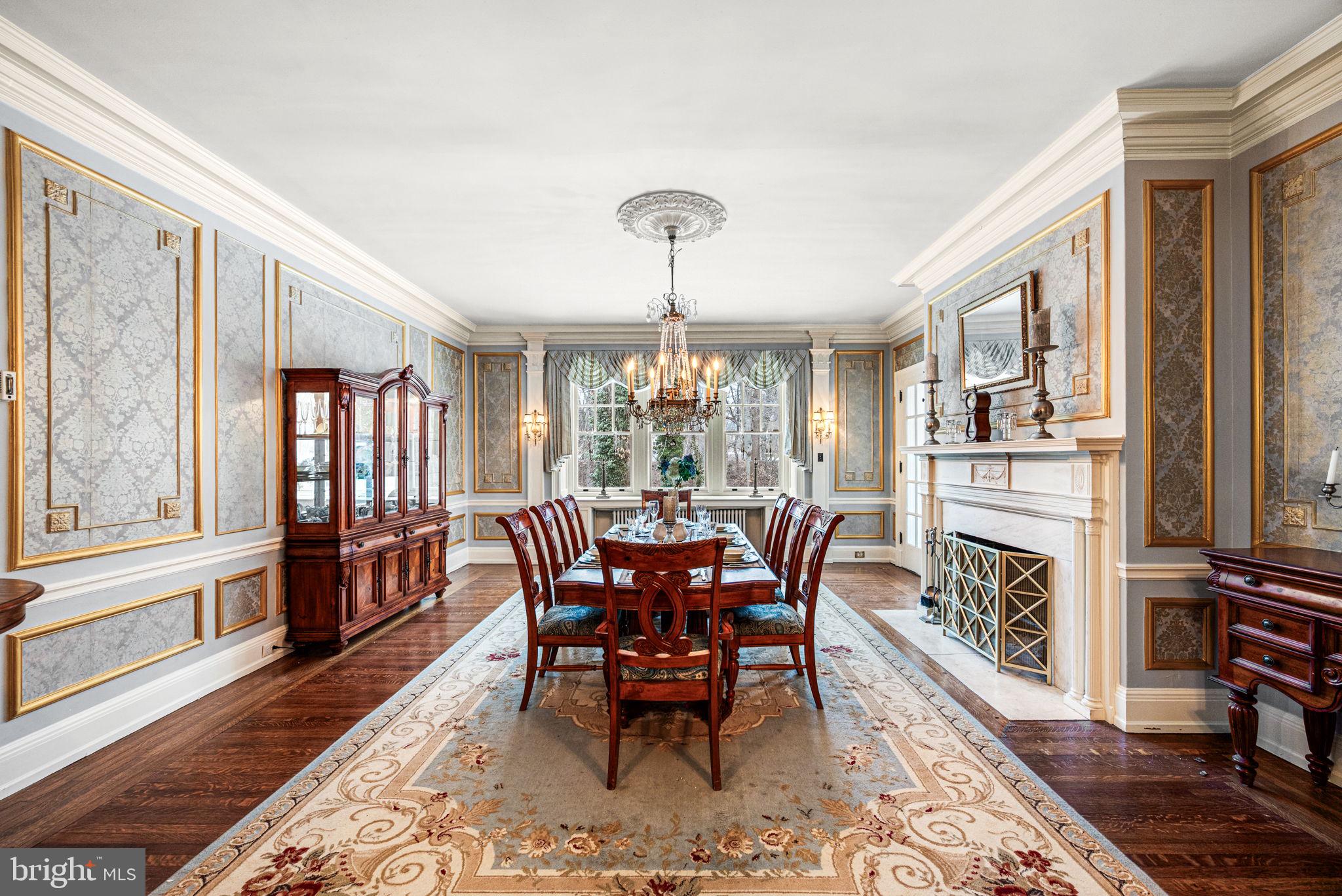 1018 Beech Road Wallingford, PA 19086 - Photo 13 of 66 a view of a dining room with furniture window and wooden floor