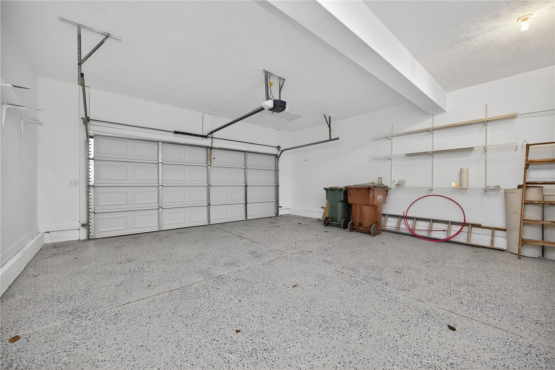811 Wind Bluff Point Springboro, OH 45066 - Photo 14 of 51 This spacious garage offers ample storage and convenient access.