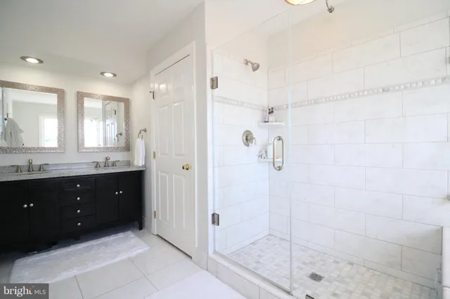 a bathroom with a bathtub and window