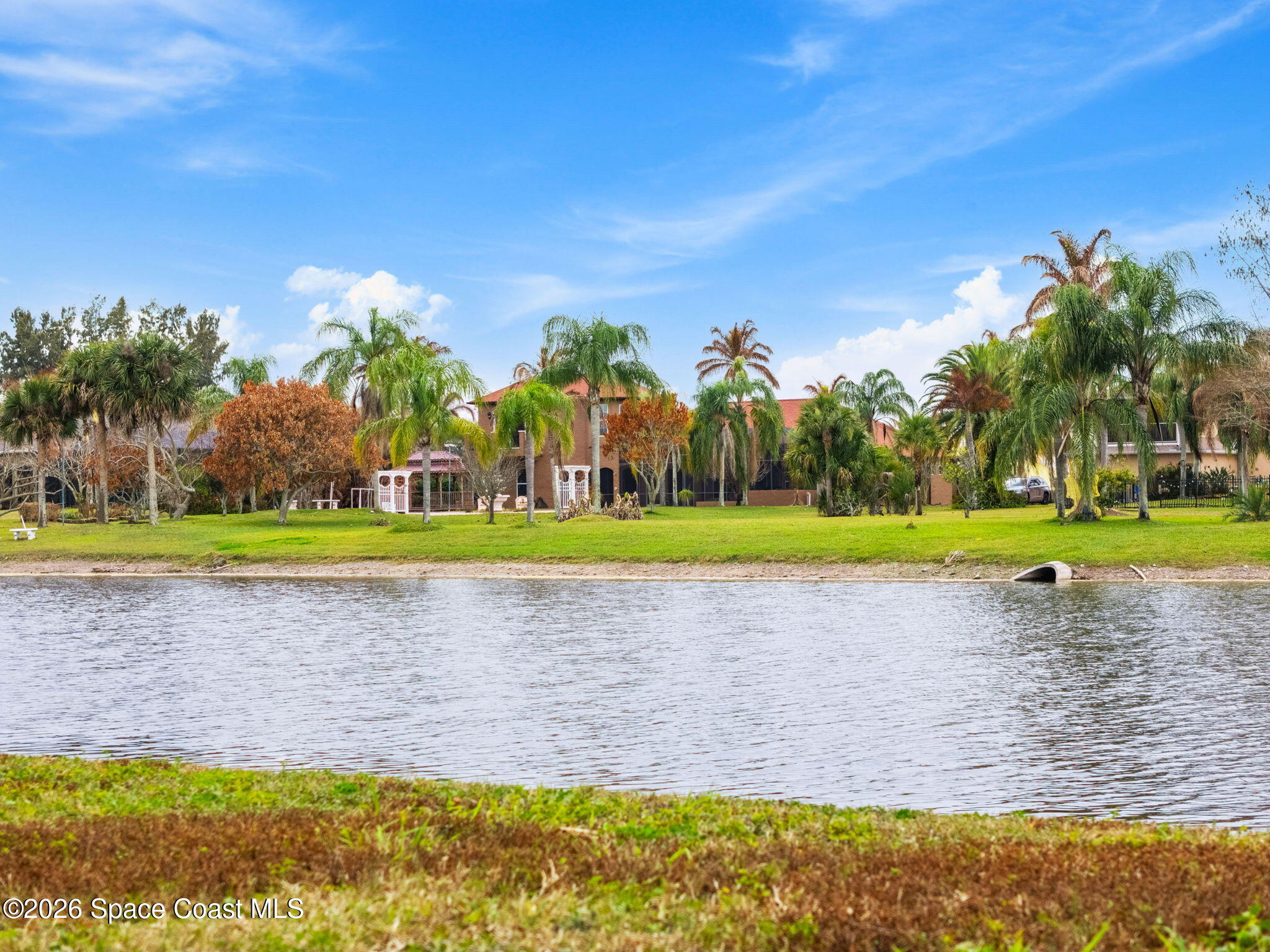 5137 Royal Paddock Way Merritt Island, FL 32953 - Photo 104 of 132 DJI_20260227142755_0036_D_1