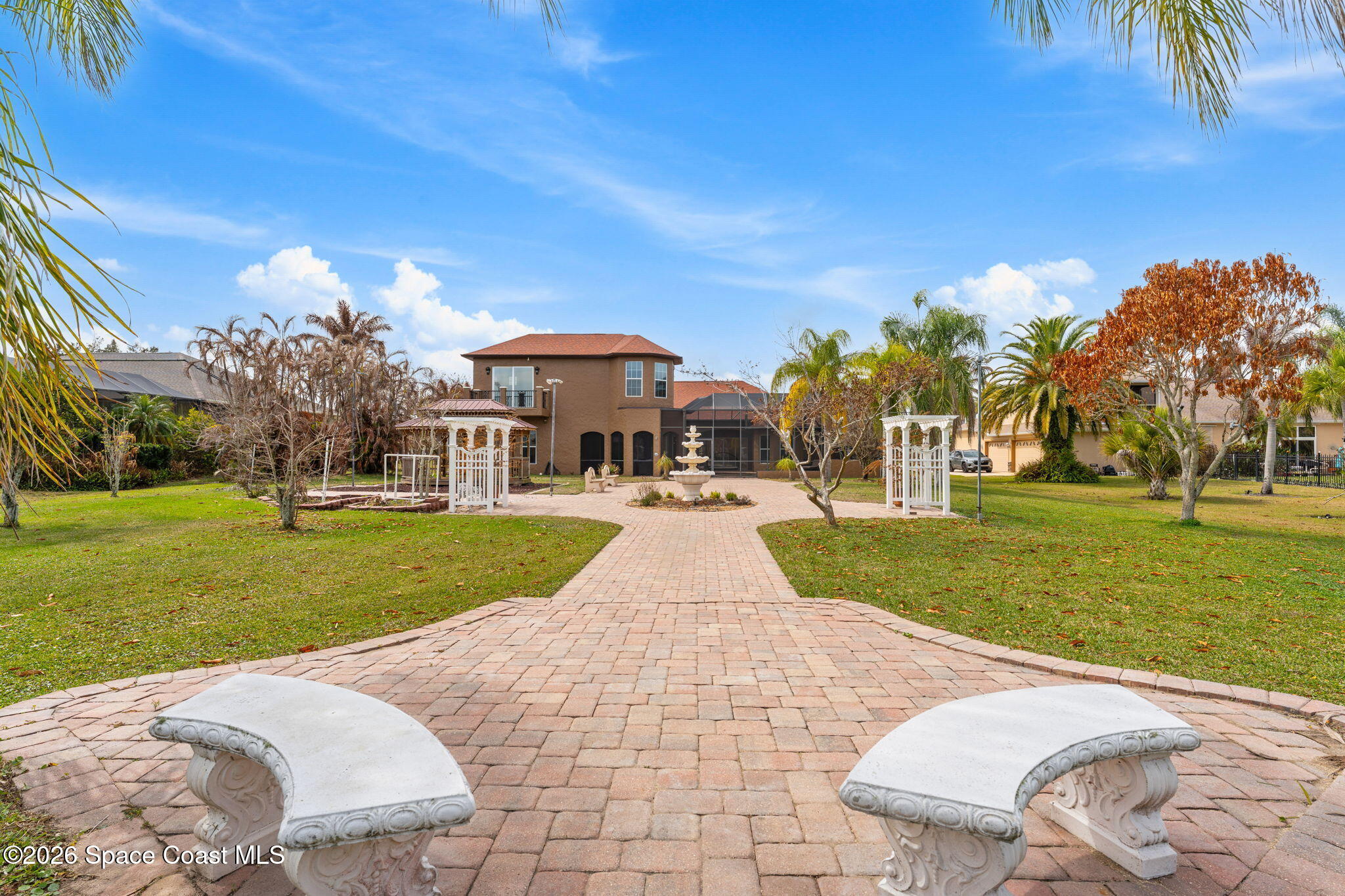 5137 Royal Paddock Way Merritt Island, FL 32953 - Photo 112 of 132 a view of a yard with plants and trees