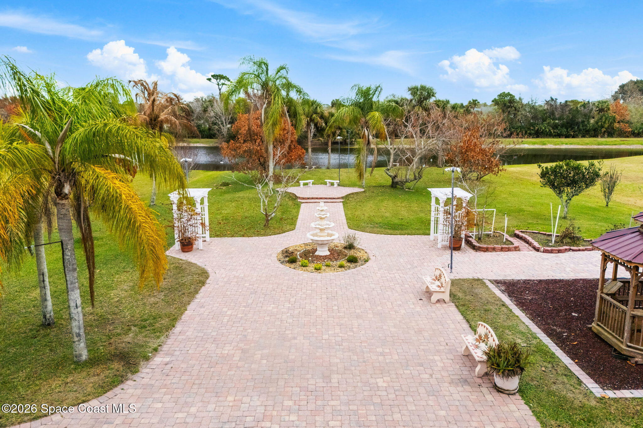 5137 Royal Paddock Way Merritt Island, FL 32953 - Photo 115 of 132 a view of a swimming pool with a patio