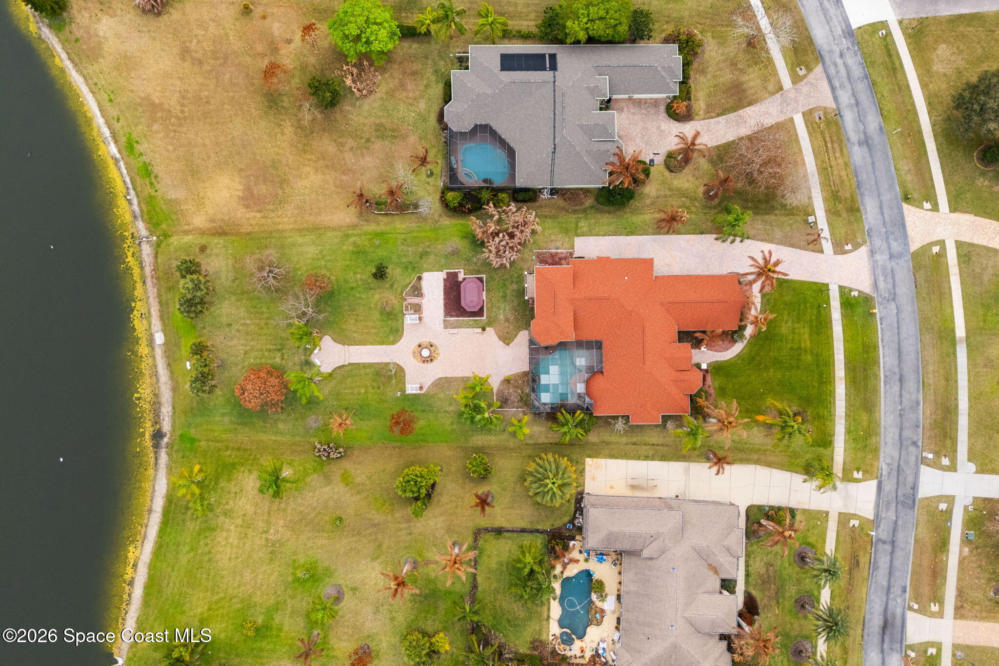 5137 Royal Paddock Way Merritt Island, FL 32953 - Photo 127 of 132 an aerial view of residential houses with swimming pool