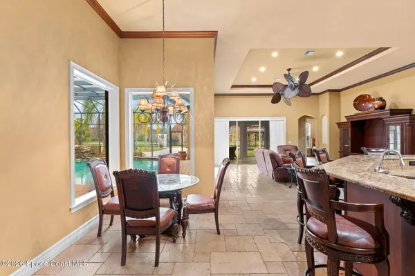 a swimming pool with outdoor seating yard and patio