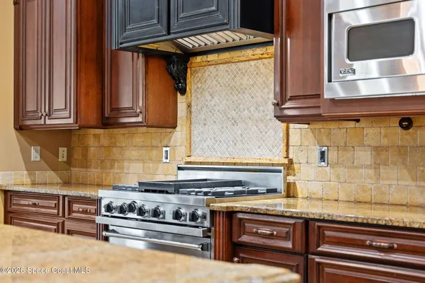 a view of a house with a swimming pool