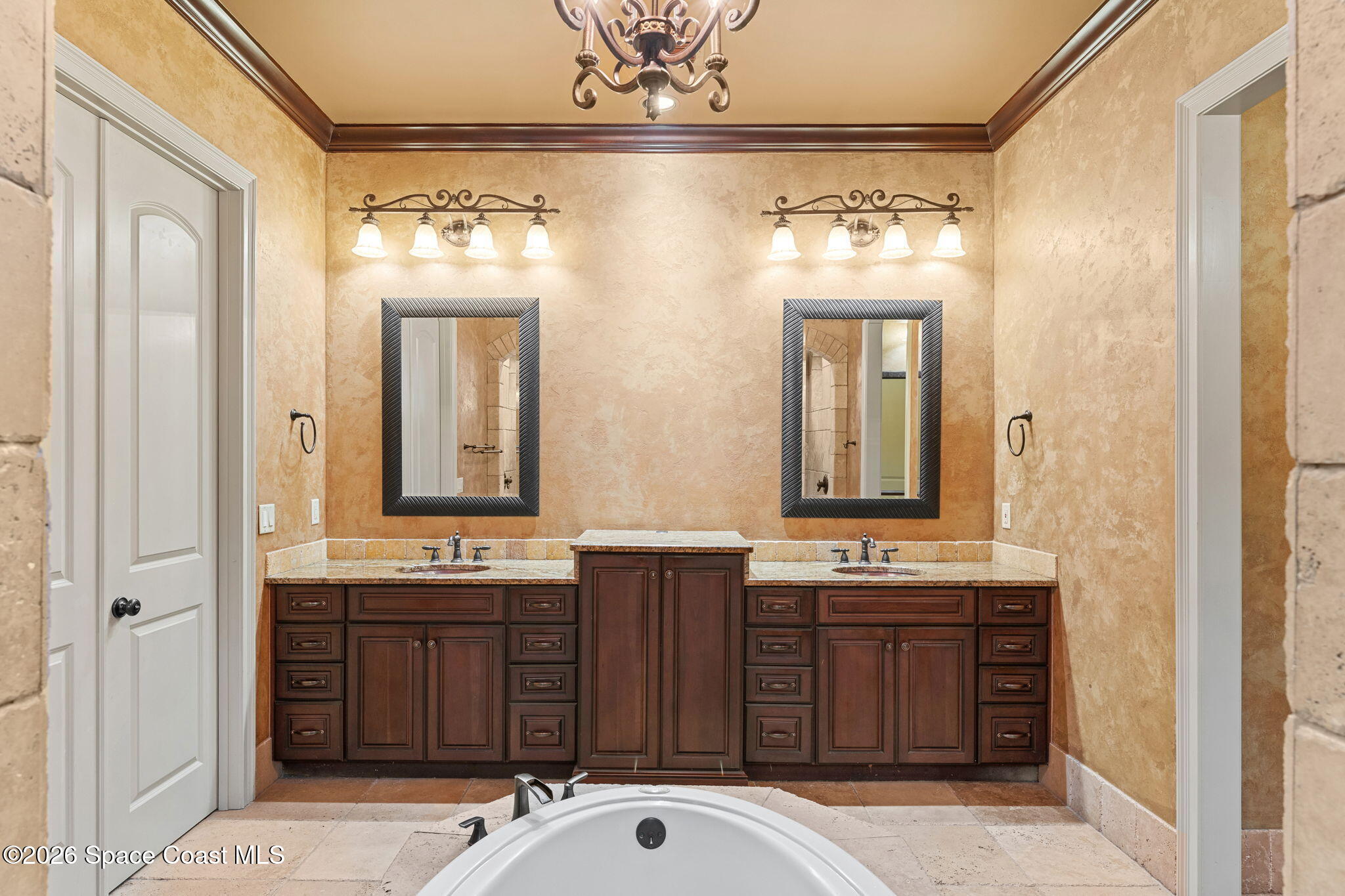 5137 Royal Paddock Way Merritt Island, FL 32953 - Photo 44 of 132 a bathroom with a sink and a mirror