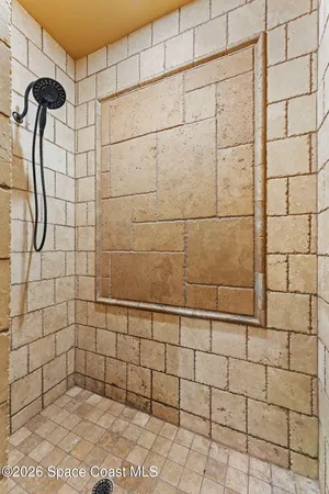 a swimming pool with outdoor seating