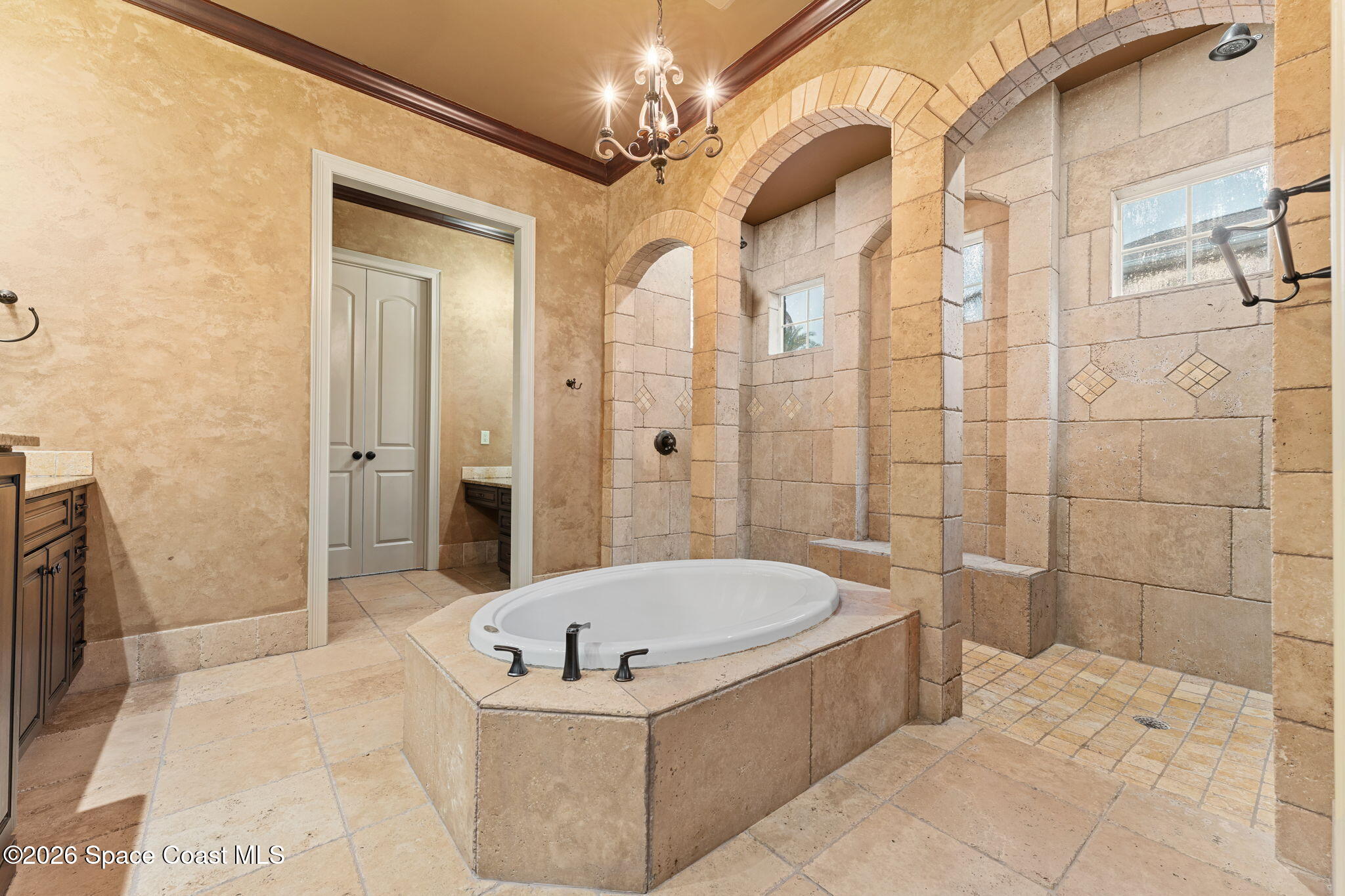 5137 Royal Paddock Way Merritt Island, FL 32953 - Photo 49 of 132 a bathroom with a tub a toilet and a shower