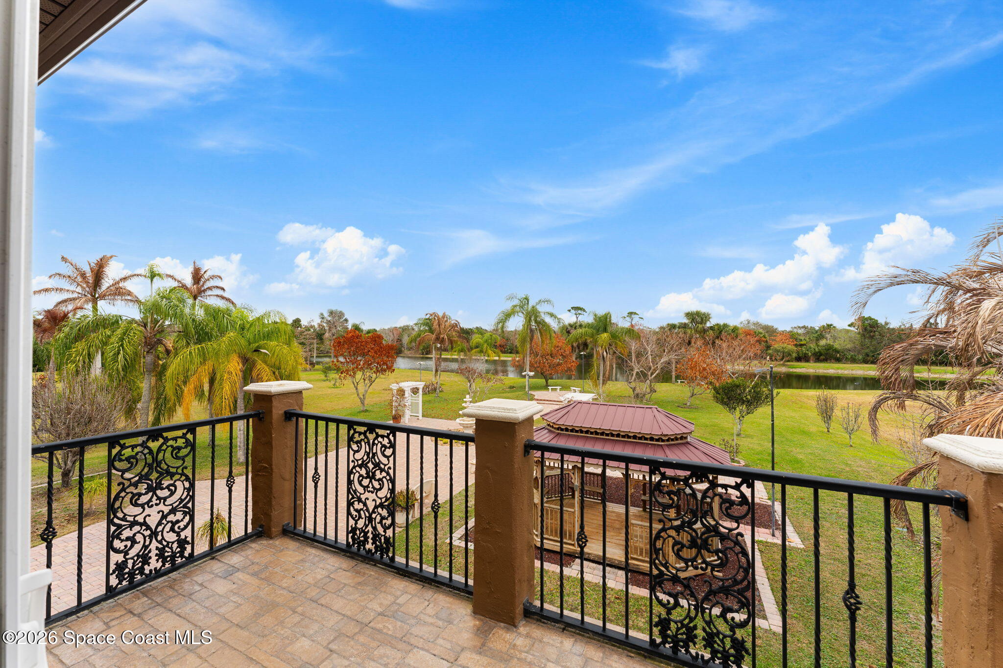 5137 Royal Paddock Way Merritt Island, FL 32953 - Photo 71 of 132 a view of a street with an ocean view