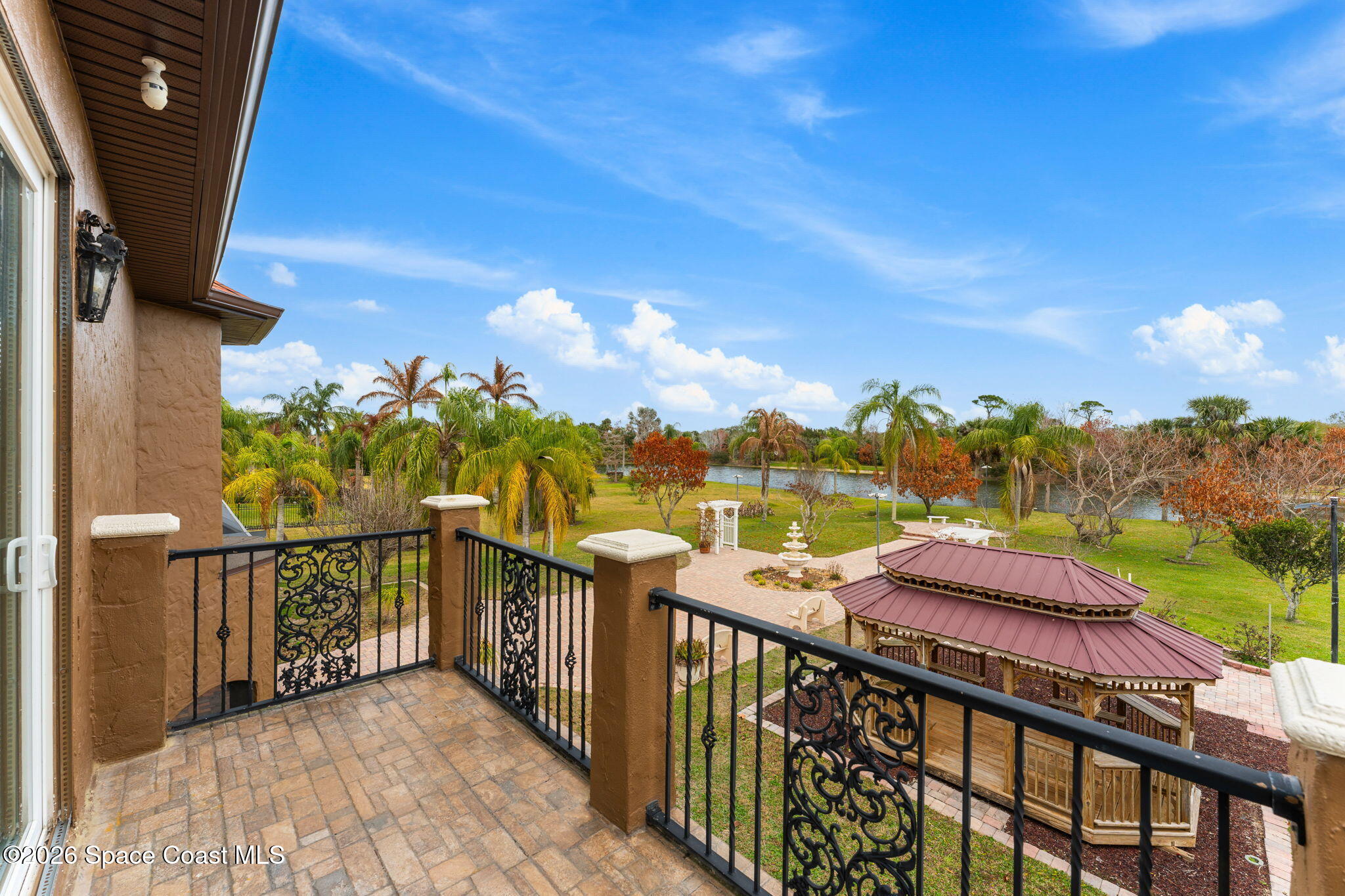 5137 Royal Paddock Way Merritt Island, FL 32953 - Photo 72 of 132 a view of a street with an ocean view