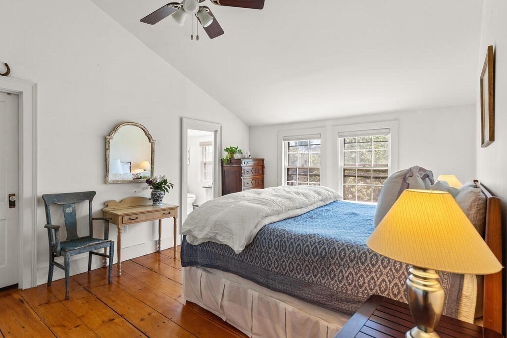 38 Washington Street Marblehead, MA 01945 - Photo 21 of 32 a bed room with a bed and a chair