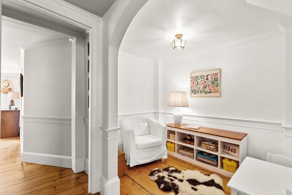 38 Washington Street Marblehead, MA 01945 - Photo 7 of 32 a bedroom with a bed and a couch