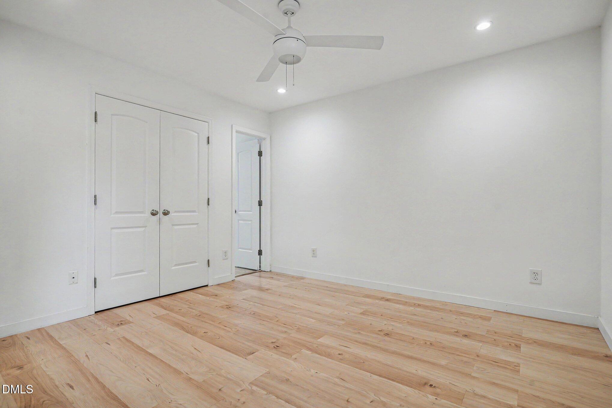 3555 Mill Run Raleigh, NC 27612 - Photo 9 of 25 wooden floor in an empty room