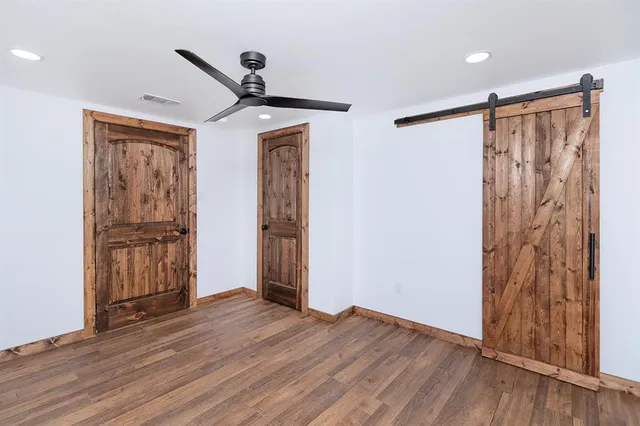a view of entryway with wooden floor