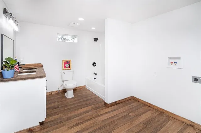 a view of kitchen with wooden floor