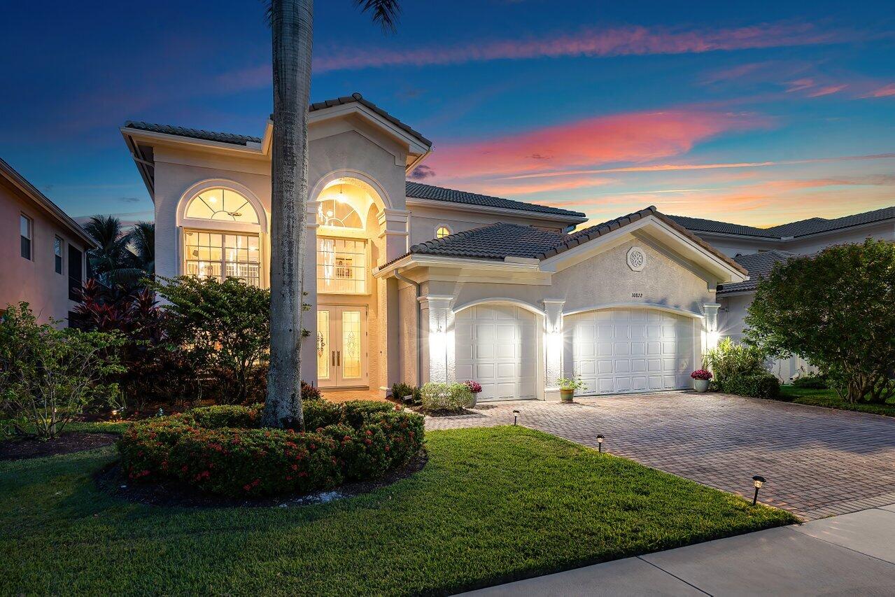 10822 Sunset Ridge Circle Boynton Beach, FL 33473 - Photo 71 of 99 a front view of a house with a yard