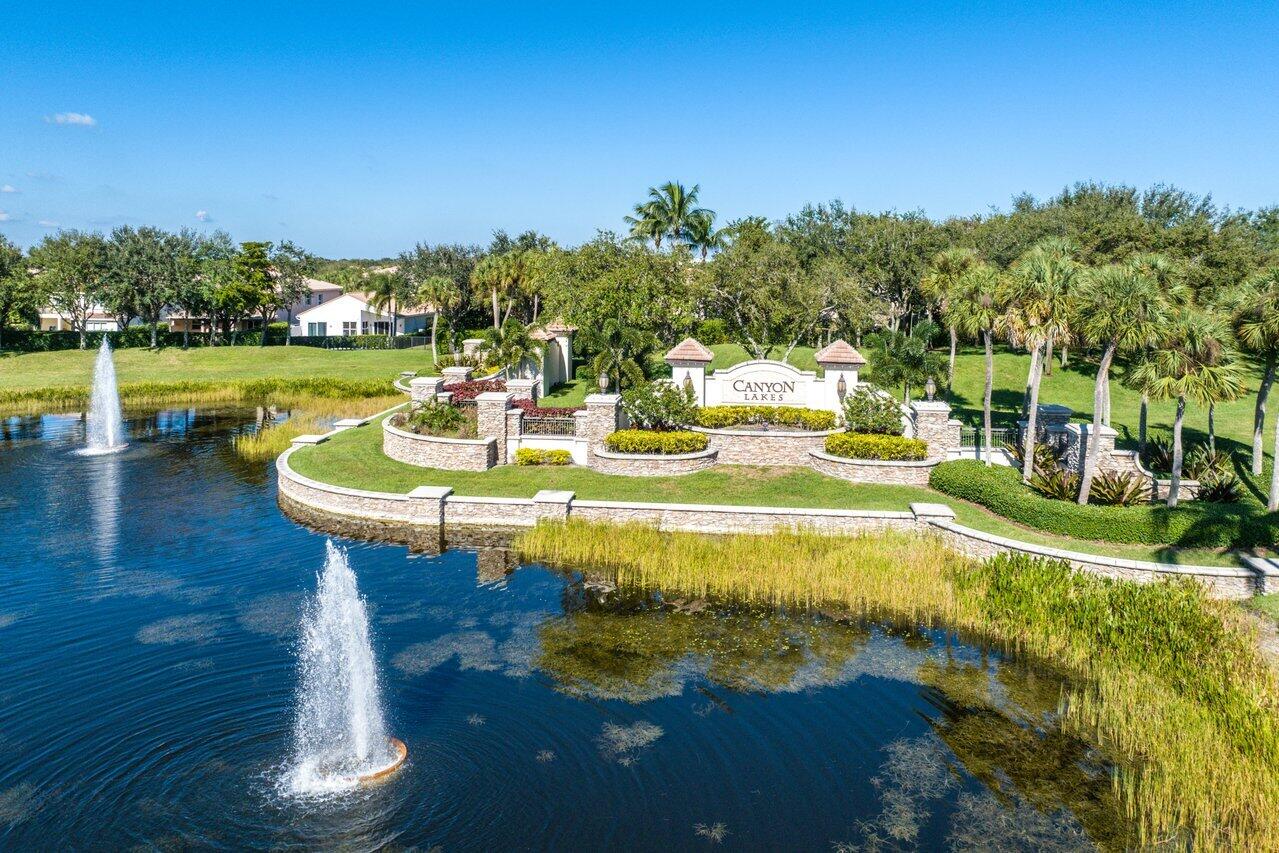 10822 Sunset Ridge Circle Boynton Beach, FL 33473 - Photo 78 of 99 a view of a swimming pool with a patio