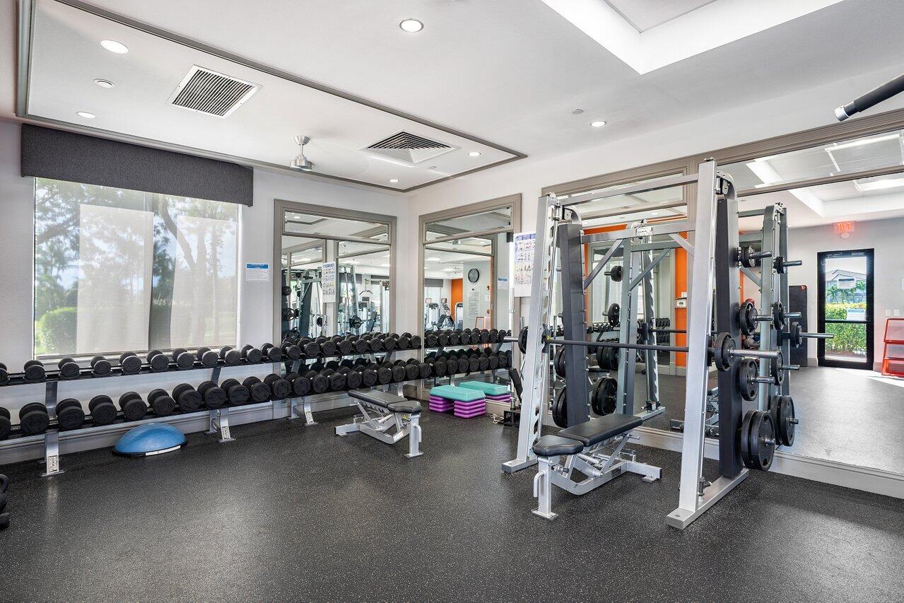 10822 Sunset Ridge Circle Boynton Beach, FL 33473 - Photo 89 of 99 a view of a room with gym equipment