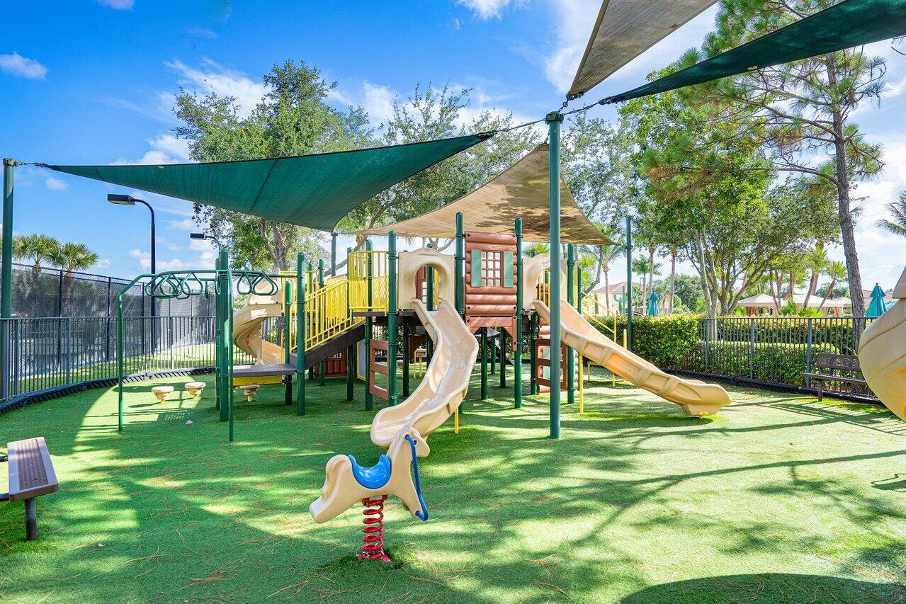 10822 Sunset Ridge Circle Boynton Beach, FL 33473 - Photo 98 of 99 a view of a park with a slide