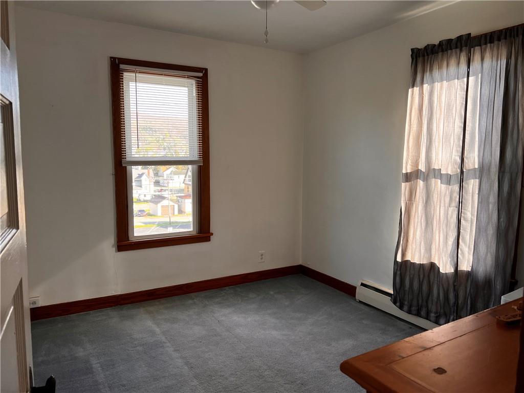 110 Walters Street Derry, PA 15627 - Photo 13 of 16 an empty room with a window