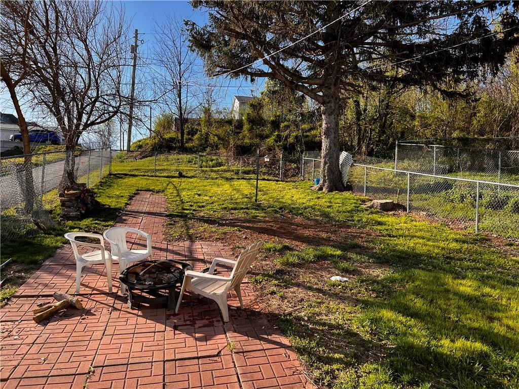 110 Walters Street Derry, PA 15627 - Photo 16 of 16 a view of backyard with swimming pool and seating space