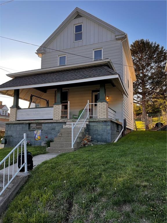 110 Walters Street Derry, PA 15627 - Photo 2 of 16 a front view of house with yard and green space