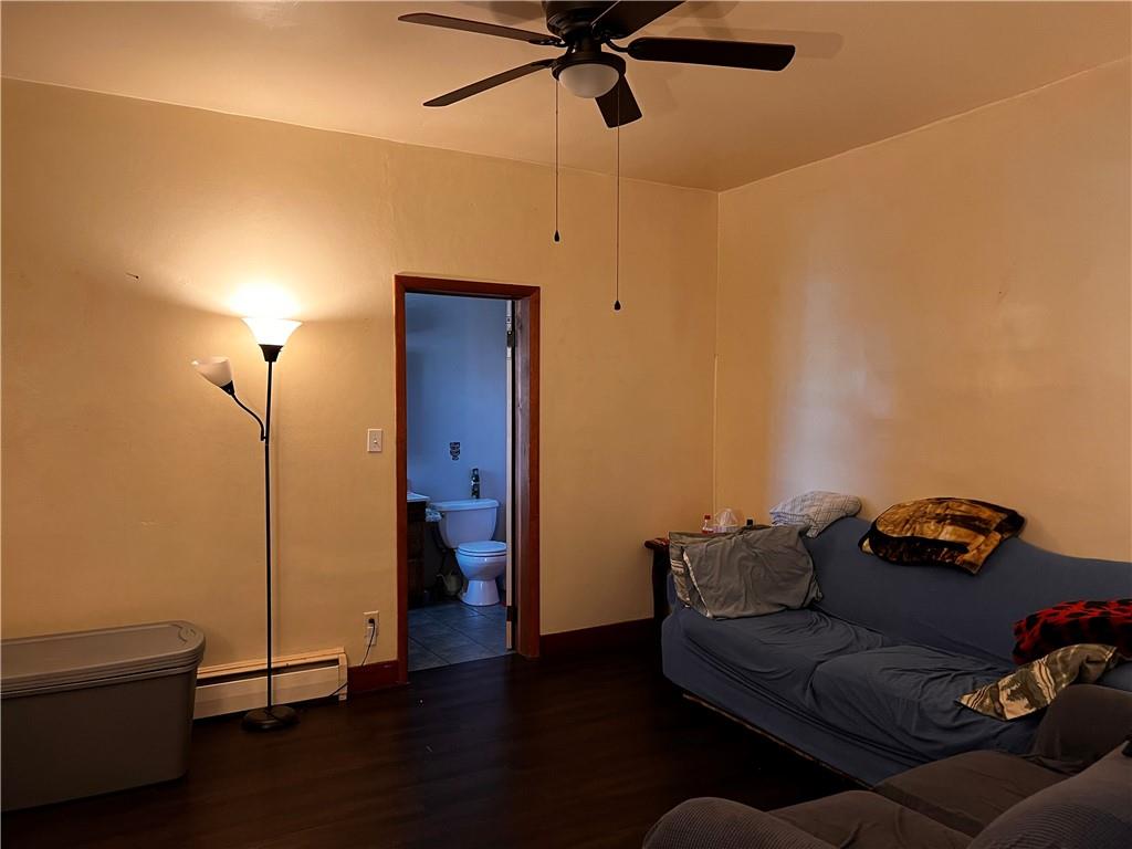 110 Walters Street Derry, PA 15627 - Photo 3 of 16 a living room with furniture and a ceiling fan