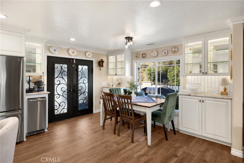 3070 Lytle Creek Road Lytle Creek, CA 92358 - Photo 13 of 68 a view of a dining room with furniture window and wooden floor