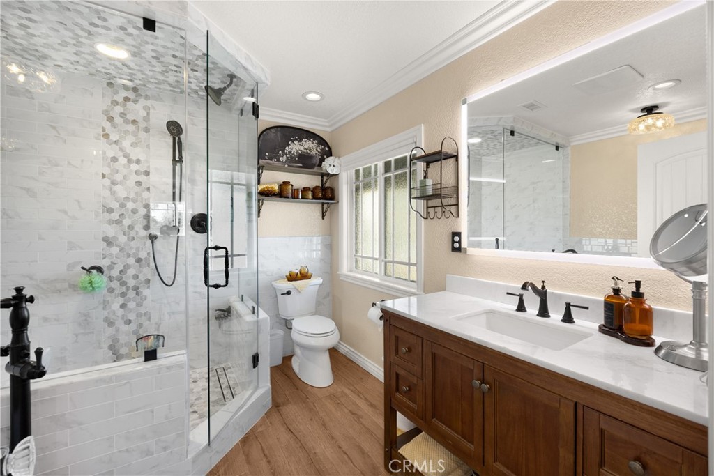 3070 Lytle Creek Road Lytle Creek, CA 92358 - Photo 23 of 68 a bathroom with a sink a toilet and shower