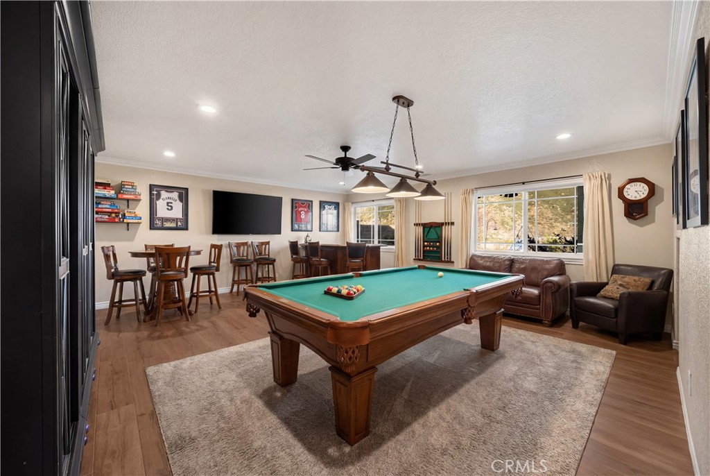 3070 Lytle Creek Road Lytle Creek, CA 92358 - Photo 27 of 68 a living room with furniture pool table and a flat screen tv