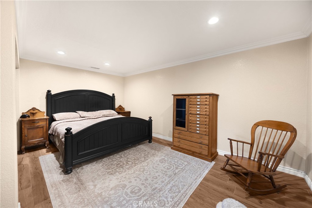 3070 Lytle Creek Road Lytle Creek, CA 92358 - Photo 31 of 68 a bedroom with a bed and chair