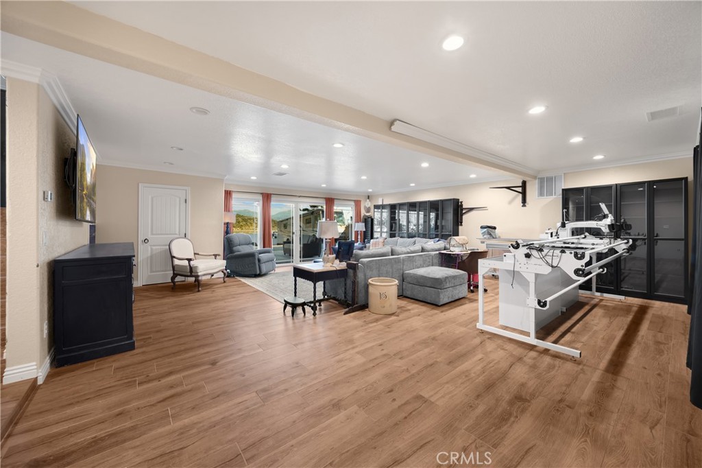 3070 Lytle Creek Road Lytle Creek, CA 92358 - Photo 34 of 68 a living room with lots of furniture and kitchen view