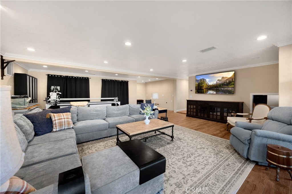 3070 Lytle Creek Road Lytle Creek, CA 92358 - Photo 39 of 68 a living room with furniture and wooden floor