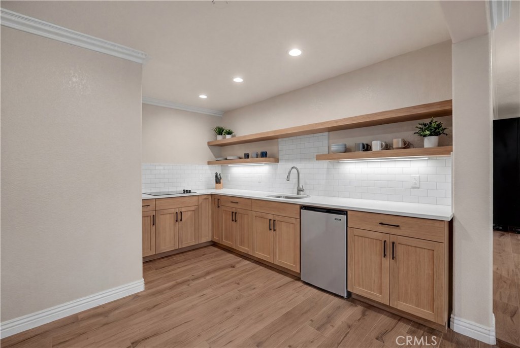 3070 Lytle Creek Road Lytle Creek, CA 92358 - Photo 40 of 68 a kitchen with sink cabinets and wooden floor