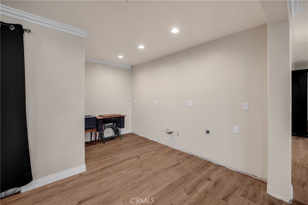 3070 Lytle Creek Road Lytle Creek, CA 92358 - Photo 42 of 68 a view of a room with wooden floor and bench