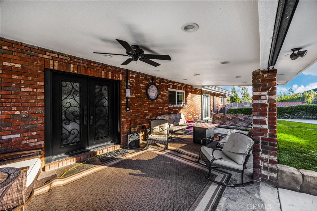 3070 Lytle Creek Road Lytle Creek, CA 92358 - Photo 45 of 68 a living room with patio furniture and a window
