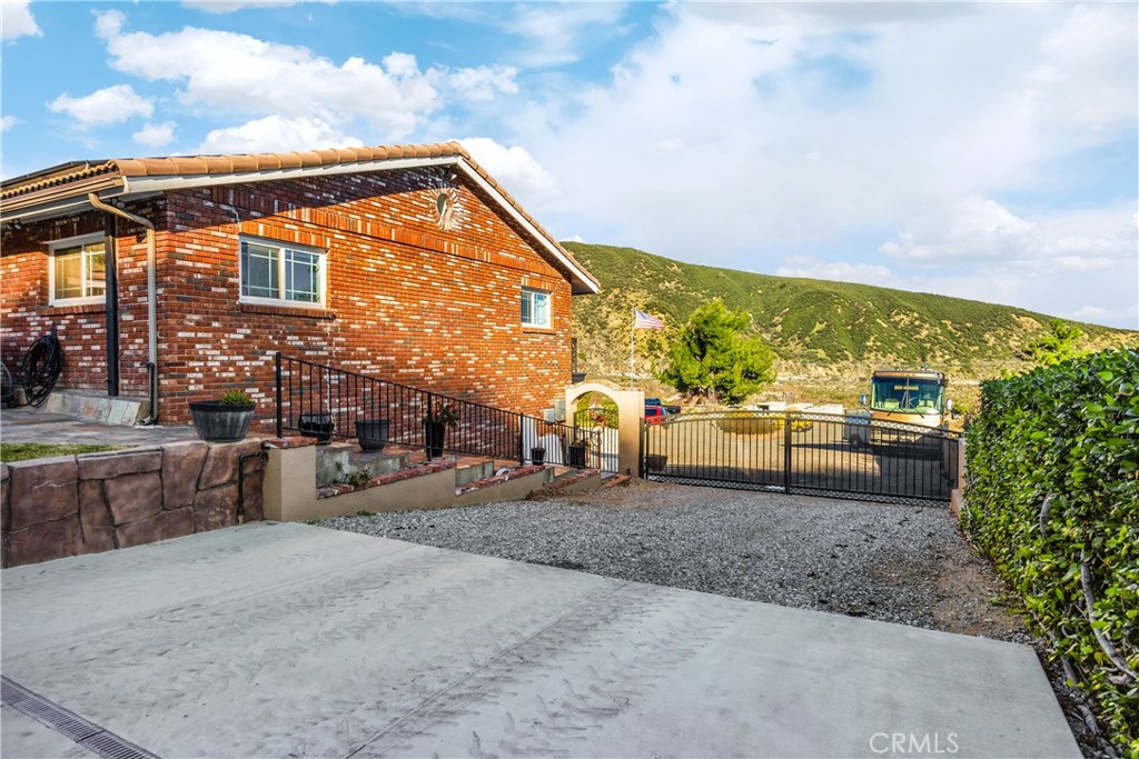 3070 Lytle Creek Road Lytle Creek, CA 92358 - Photo 49 of 68 a view of a house with backyard and sitting area